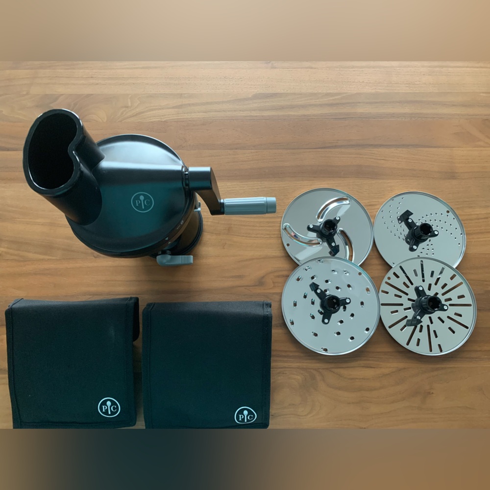 NWOT Pampered Chef Multi-Grater, Slicer. Never used! With attachments & storage.